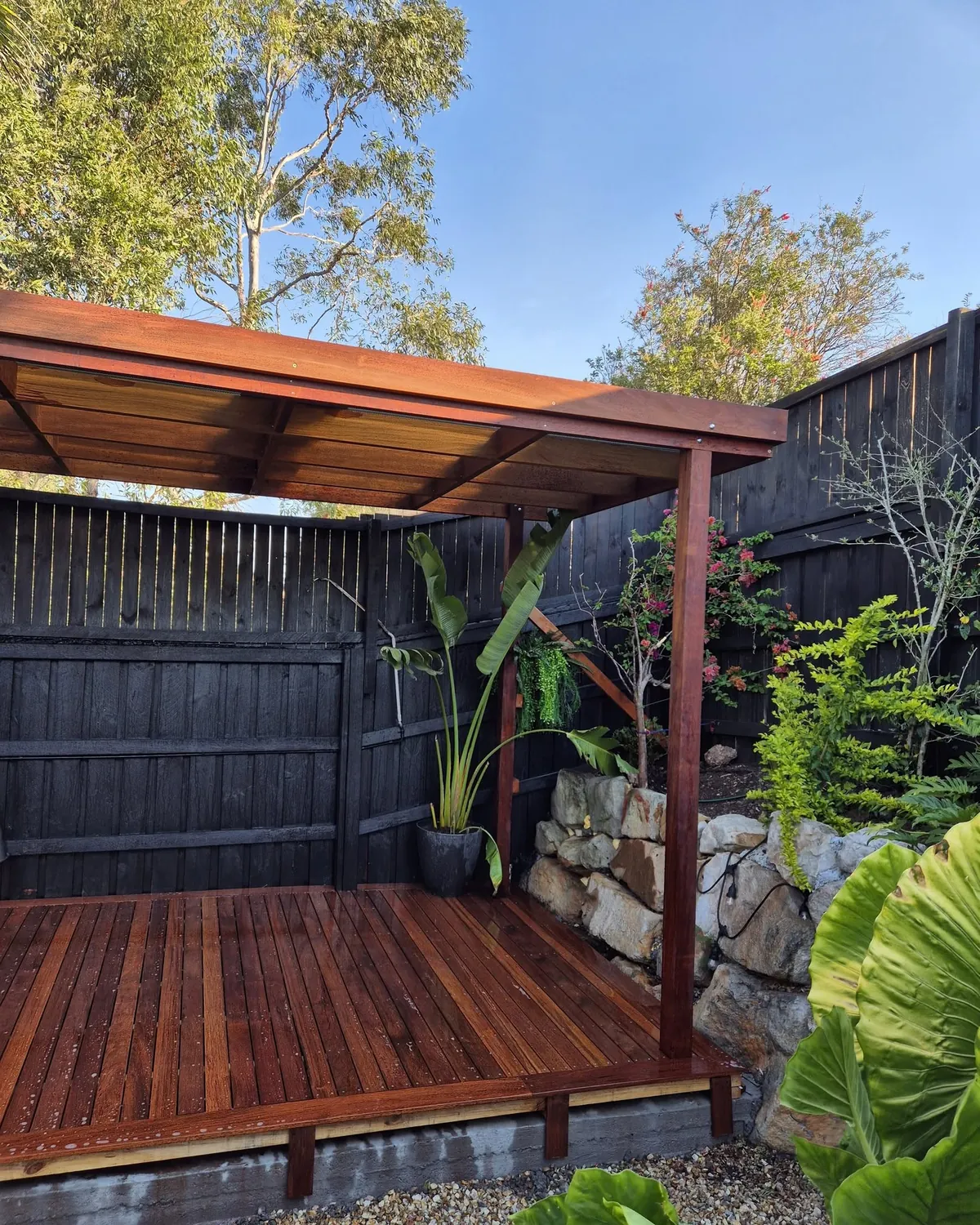 Deck and pergola in a tropical garden
