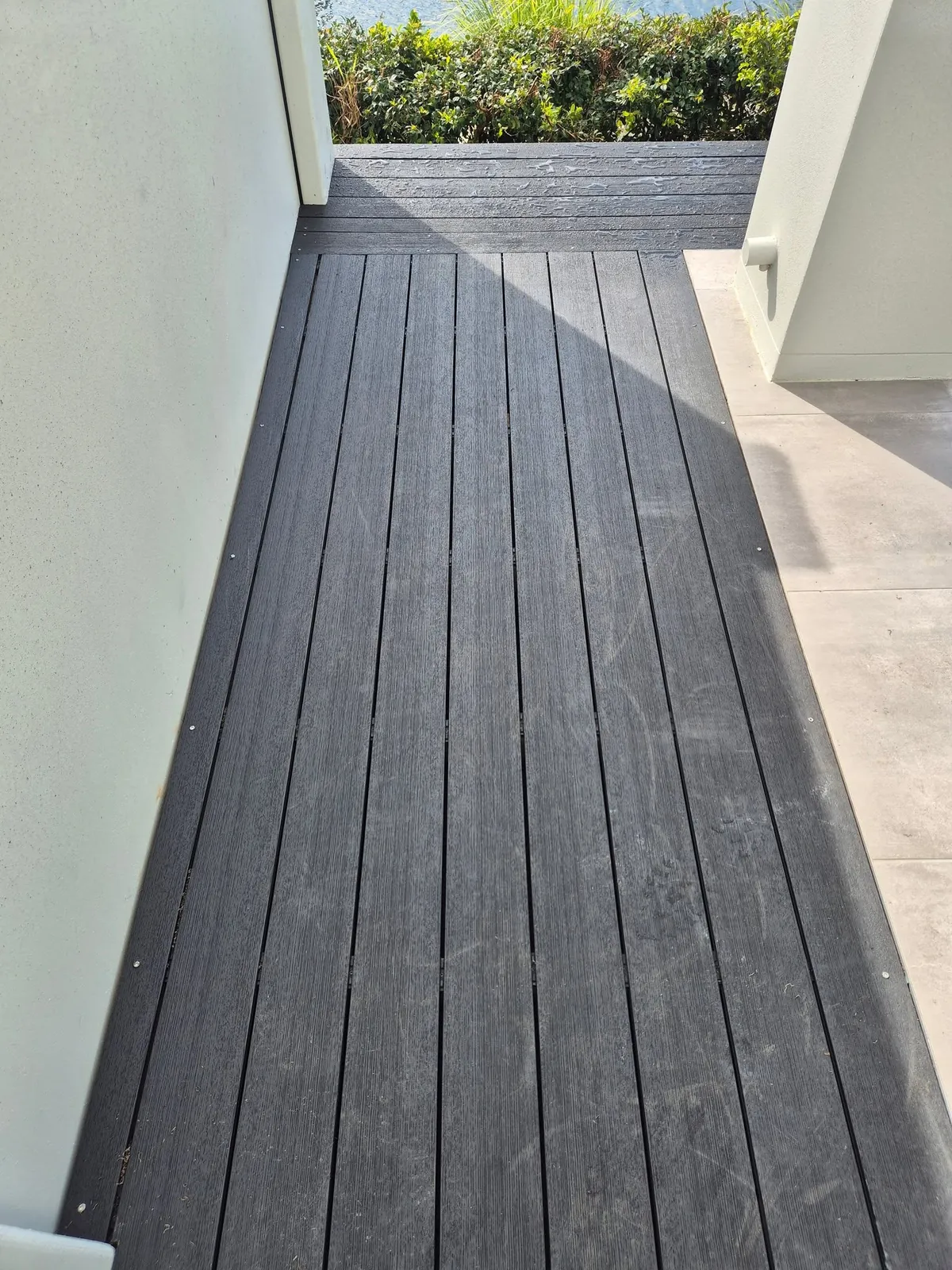 Dark composite walkway